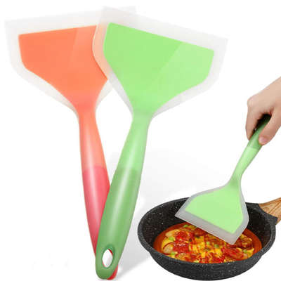 A Não-vara que cozinha panquecas seguras do silicone trabalha com pá para ovos pesca a pizza da panqueca