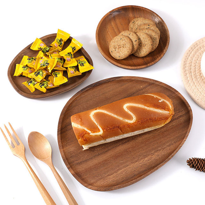 Fontes dadas forma irregulares da cozinha da placa de jantar dos utensílios de mesa da madeira maciça