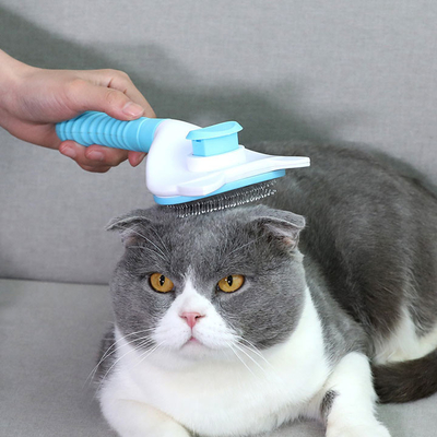 Escova de aço inoxidável feita sob encomenda do removedor do cabelo do animal de estimação dos eletrodomésticos para o gato do cão