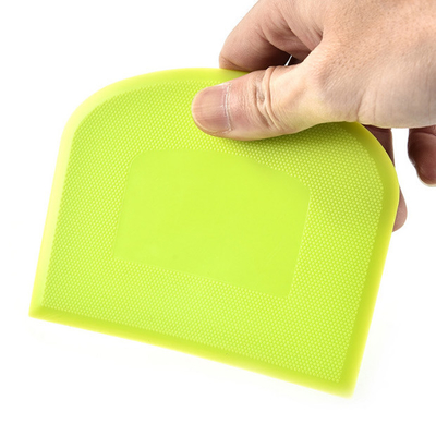 Os produtos plásticos dos eletrodomésticos plásticos seguros do alimento rolam cortador do raspador da massa
