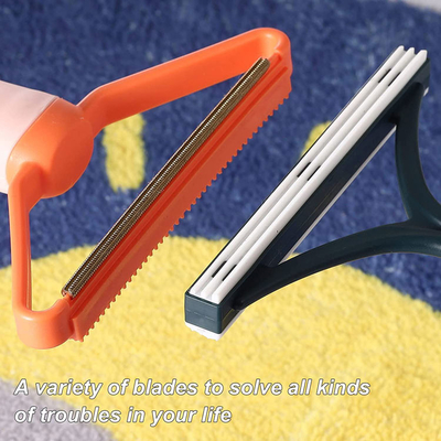 O metal plástico portátil desarraiga o rolo do removedor do cabelo da roupa da poeira do fiapo para o tapete do sofá